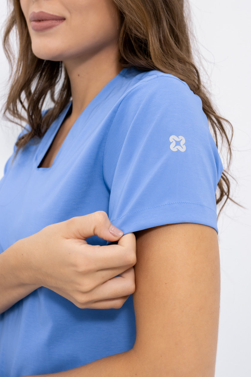 Blusa médica agua azul tela que estira